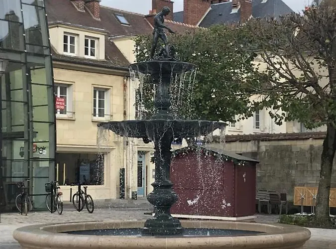 Très bel appartement de style ancien avec sa terrasse en bois en coeur de ville